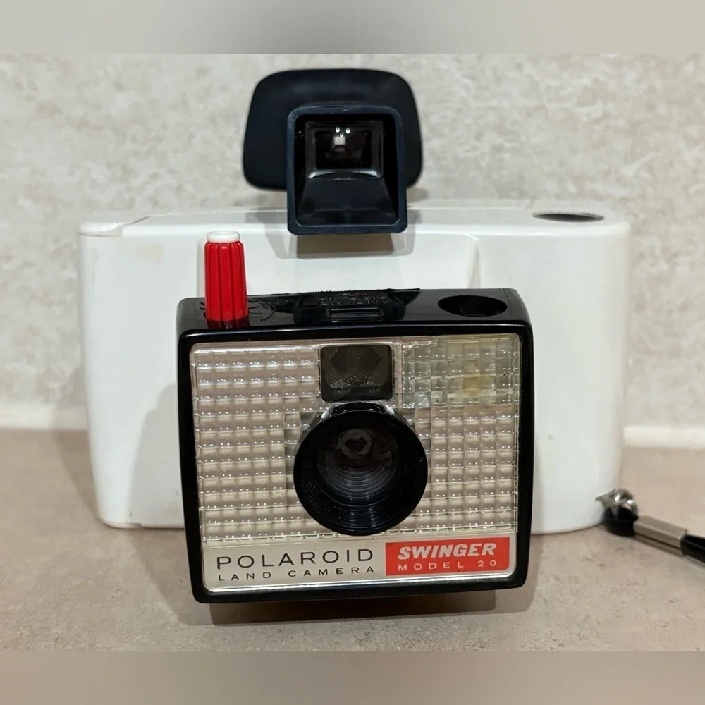 Vintage Polaroid Swinger camera and case